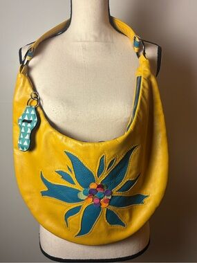 Yellow Leather Hobo Bag with Blue Floral Appliqué